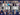 Collage of multiple people in a virtual meeting with 'The Back Lounge' text overlay.